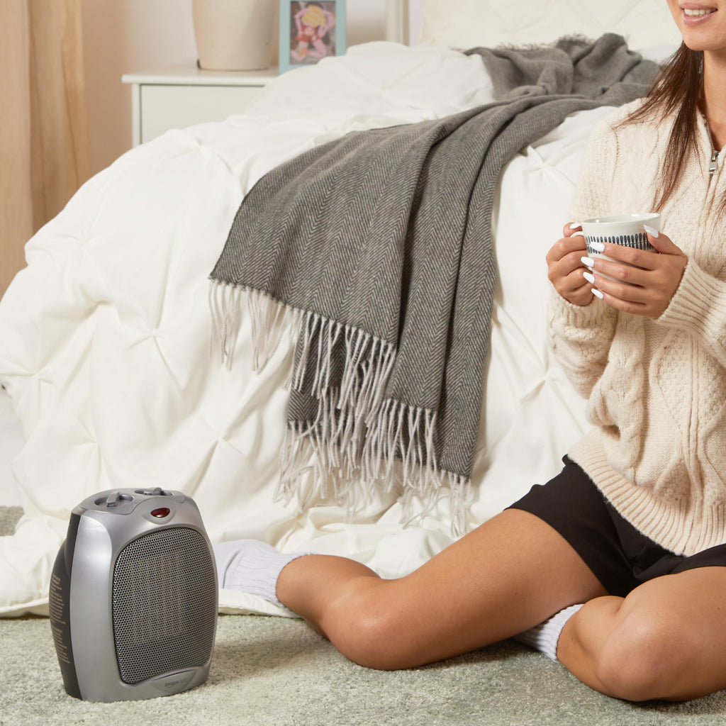 Amazon Basics Ceramic Space Heater, Portable Indoor Heating Solution, With Overheat and Tip-Over Protection, Thermostat, Non-Oscillating, 1500W, 7.52"D x 6.34"W x 9.45"H, Black