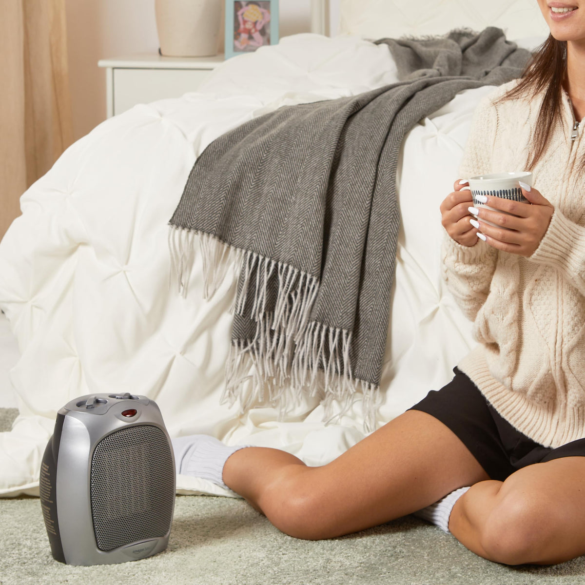 Amazon Basics Ceramic Space Heater, Portable Indoor Heating Solution, With Overheat and Tip-Over Protection, Thermostat, Non-Oscillating, 1500W, 7.52"D x 6.34"W x 9.45"H, Black